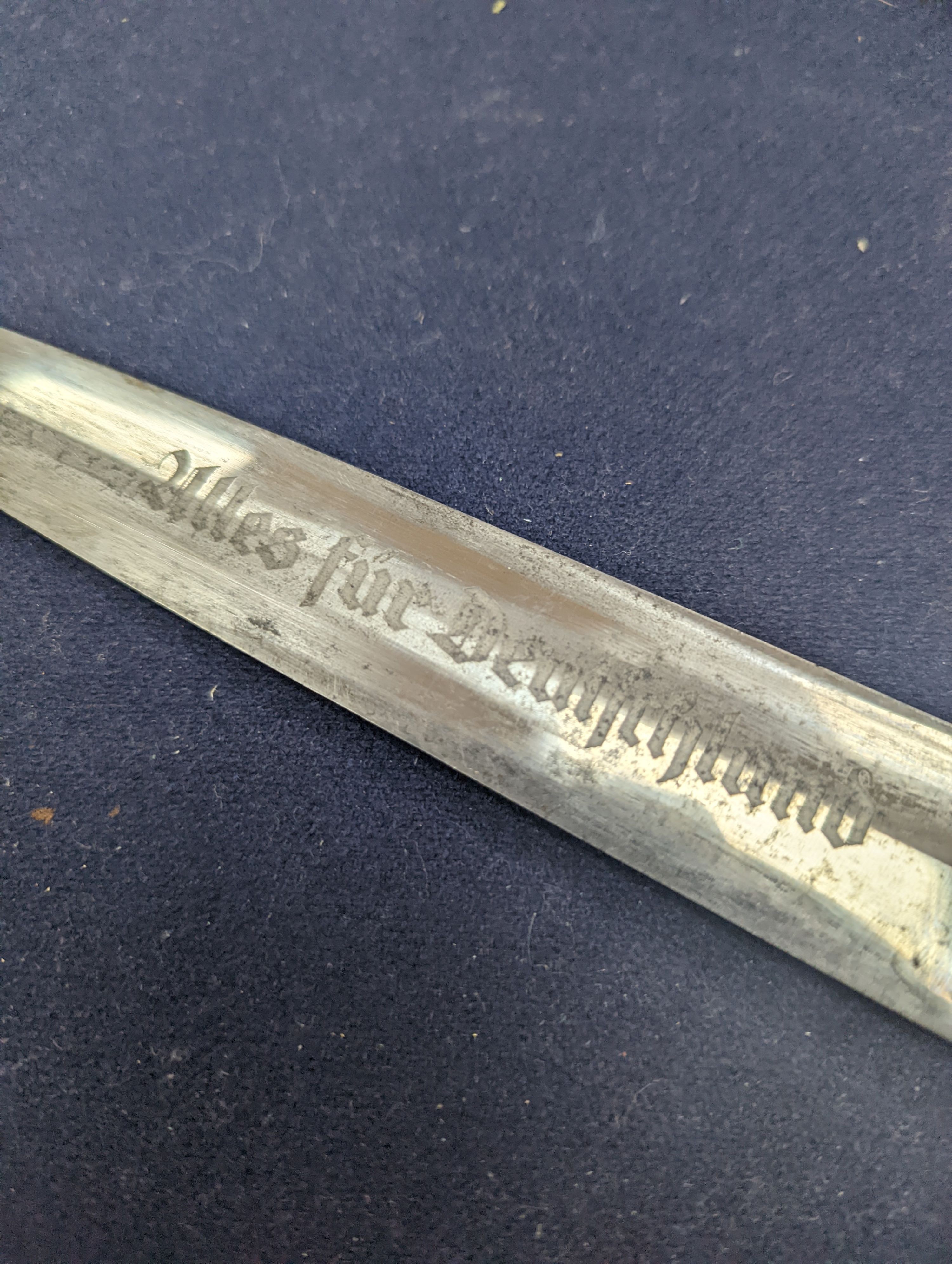 A Third Reich SA dagger within sheath, blade 22cm., and a bayonet within scabbard